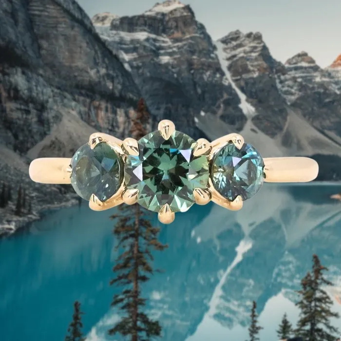 Rings Daniel Stair 082ct Songea and Nigerian Teal Sapphire Three Stone Ring in 14K Yellow Gold Rings Daniel Stair 082ct Songea and Nigerian Teal Sapphire Three Stone Ring in 14K Yellow Gold