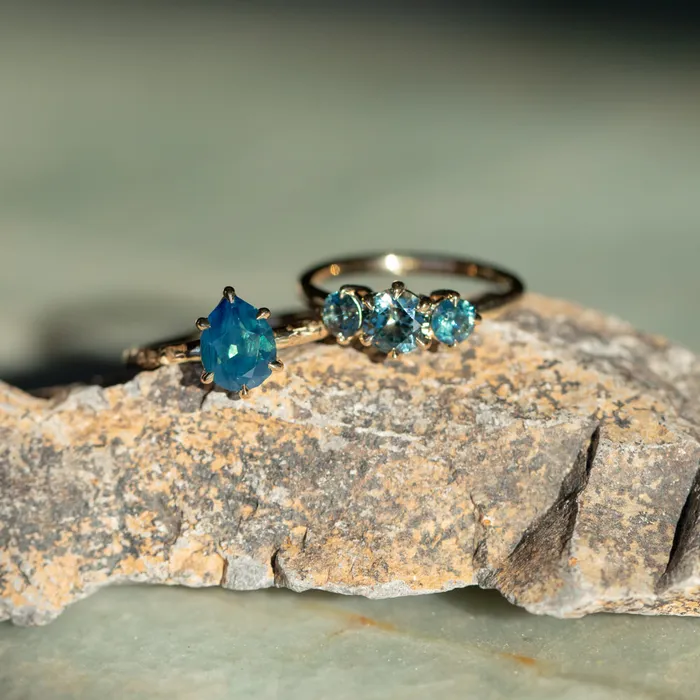 Rings Daniel Stair 082ct Songea and Nigerian Teal Sapphire Three Stone Ring in 14K Yellow Gold