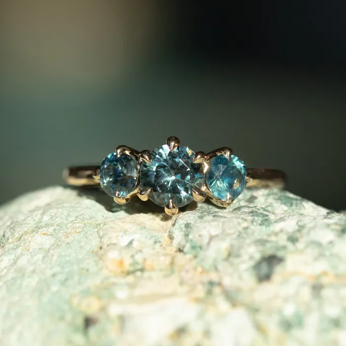Rings Daniel Stair 082ct Songea and Nigerian Teal Sapphire Three Stone Ring in 14K Yellow Gold