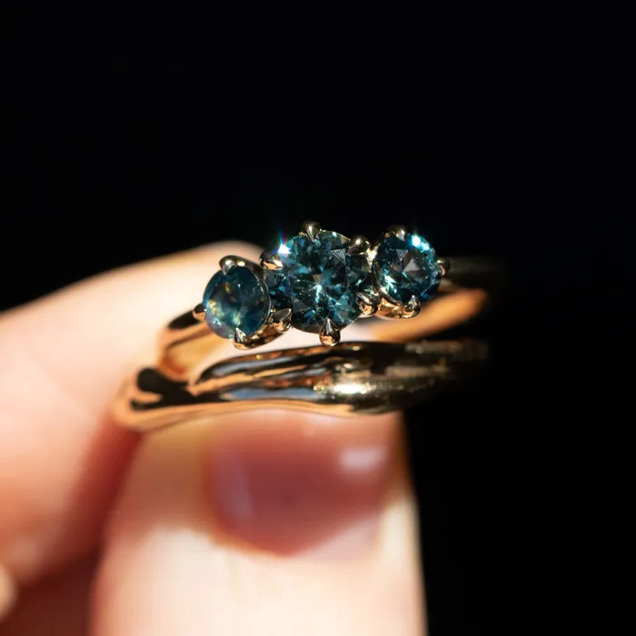 Rings Daniel Stair 082ct Songea and Nigerian Teal Sapphire Three Stone Ring in 14K Yellow Gold