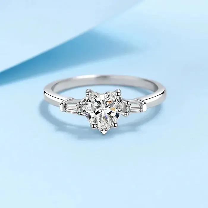 Luxus Moissanite Platinum Plated Silver 3 Stone Heart Moissanite Ring 12ct Total Rings Luxus Moissanite Platinum Plated Silver 3 Stone Heart Moissanite Ring 12ct Total Rings